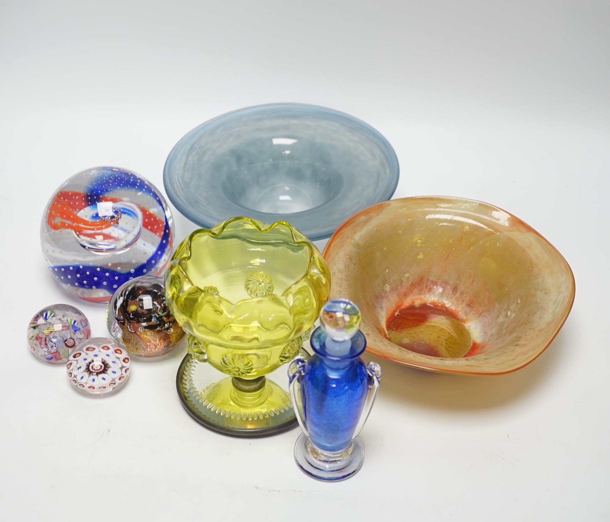 A group of mixed studio glass and a collection of four paperweights including one large Caithness